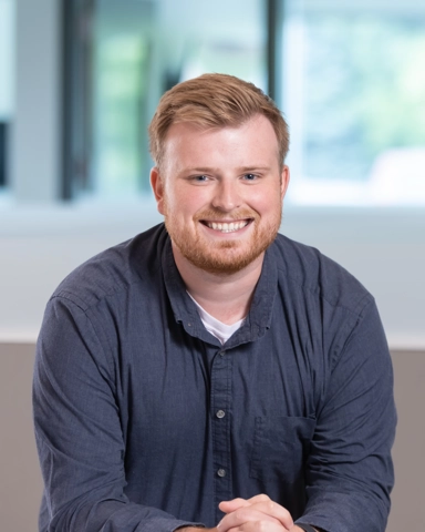 portrait of a smiling man in professional attire